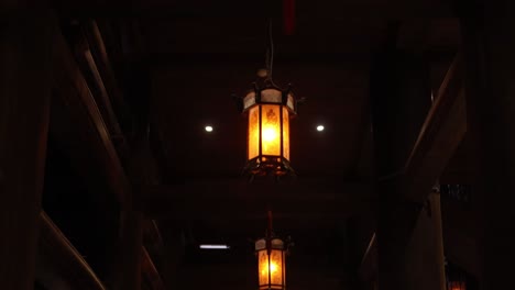 lanterns lit on the interior of a confucian temple of literature in hanoi the capital city of vietnam in southeast asia