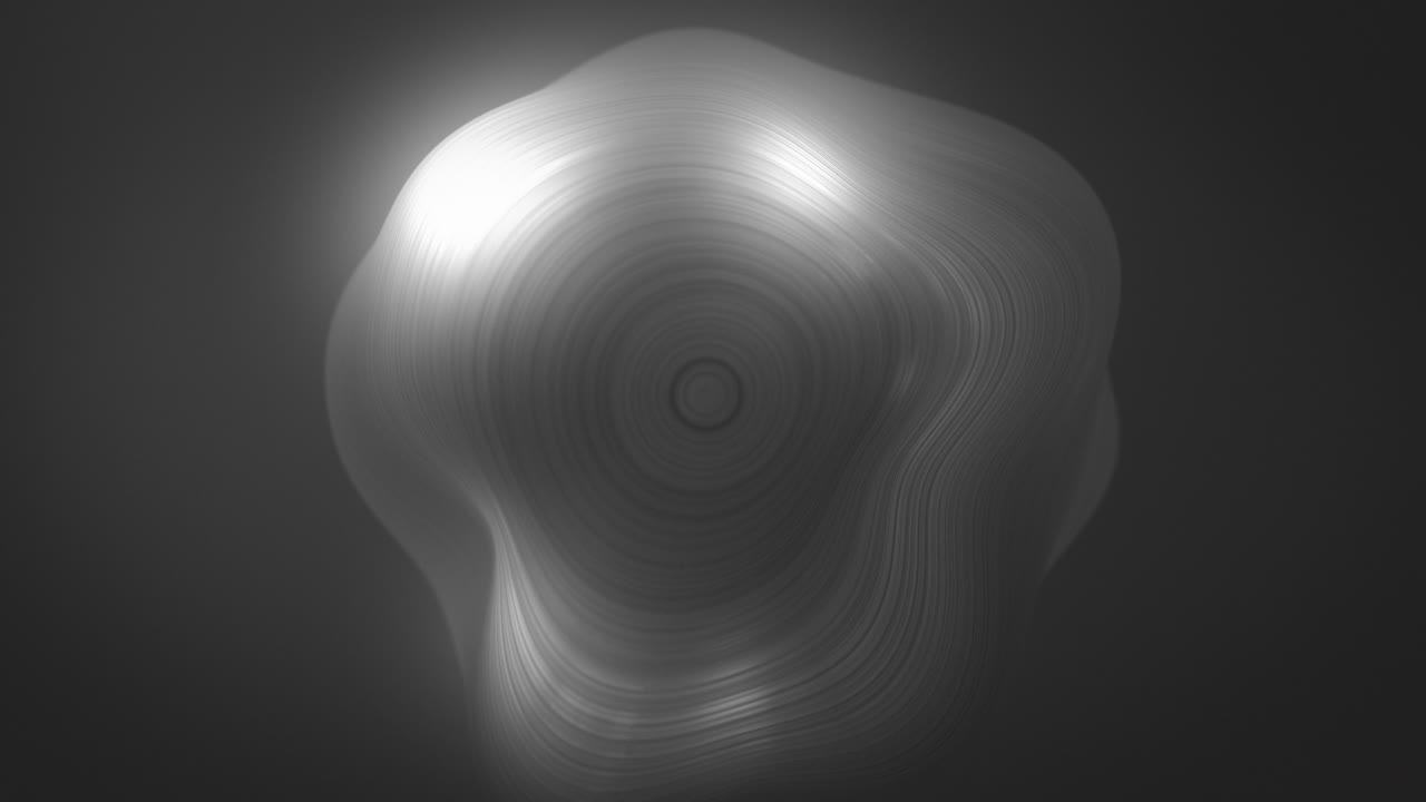 luces que se reflejan en la esfera metálica que gira