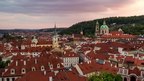 day to night sunset timelapse from prague, czech republic with a view of the red roofs of mala strana, st