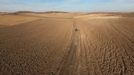an offroad vehicle driving through the landscape