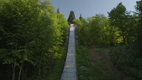 unused ski jump slope during summer in bakuriani, georgia