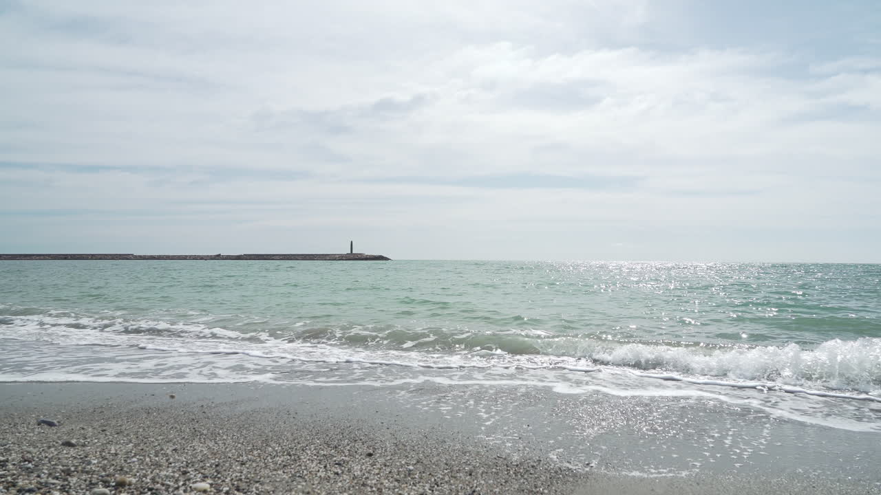 View of beach sea on sun light in the summer. Almerimar, Almeria, Andalusia, Spain