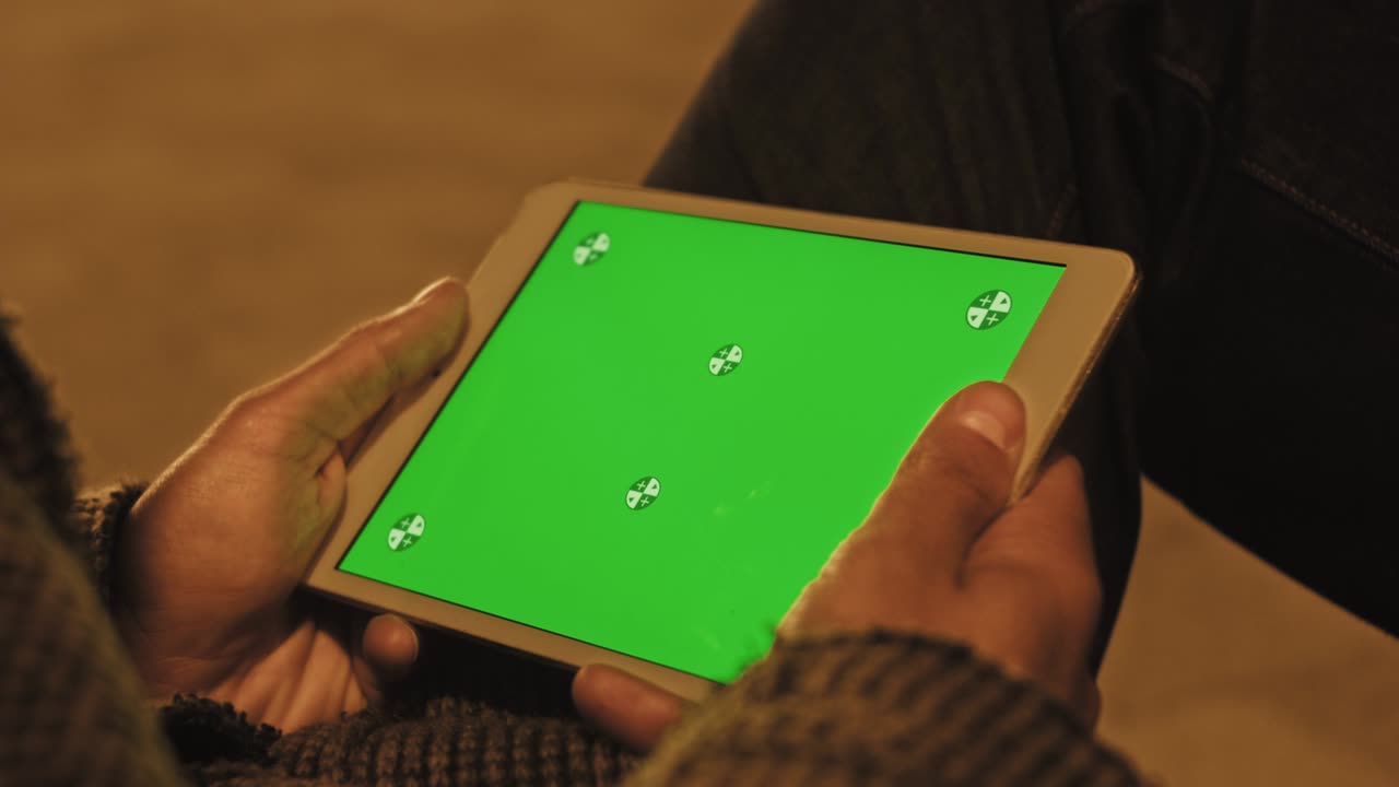 Green Screen and Chroma Key of Tablet Computer. Business Man Holding Mobile PC Close-Up. Greenscreen of Chromakey Mockup with Tracking Markers. Office Worker Shopping at Web Store or Working on Pad