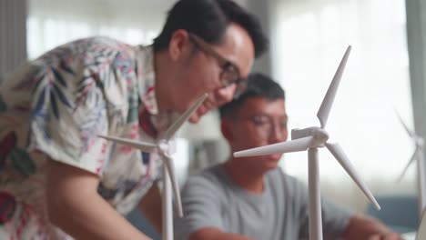 two men discussing renewable energy project