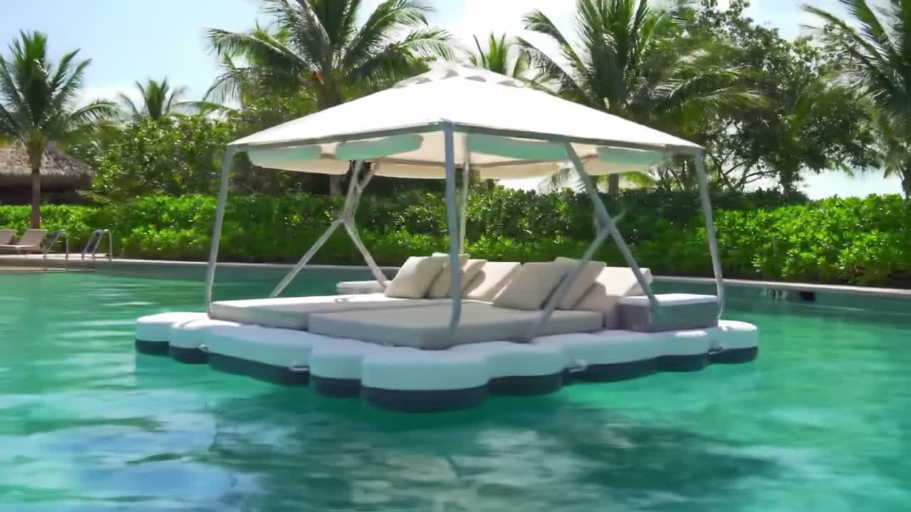 A Tranquil Oasis: Relax and Unwind on a Plush Floating Lounger ...