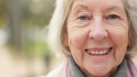 Happy,-portrait-and-senior-woman-in-park