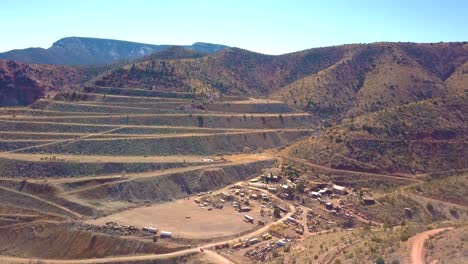 aerial pan of gold mine and ghost town