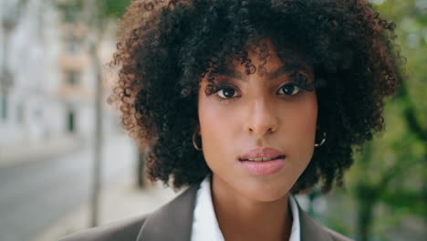 Gorgeous-model-posing-street-closeup.-Young-african-american-woman-standing-town