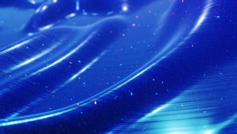 Stylish abstract blue surface as fantastical festive bg. Looped background, waves move on glossy surface like landscape made of liquid blue wax with sparkles. Beautiful soft bg with smooth animatin 4k