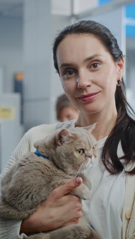 woman holding a cat