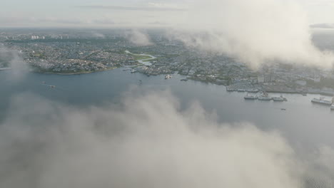 Aerial-flyover-of-clouds-in-the-morning-of-the-Amazon-River-in-Manaus,-Brazil