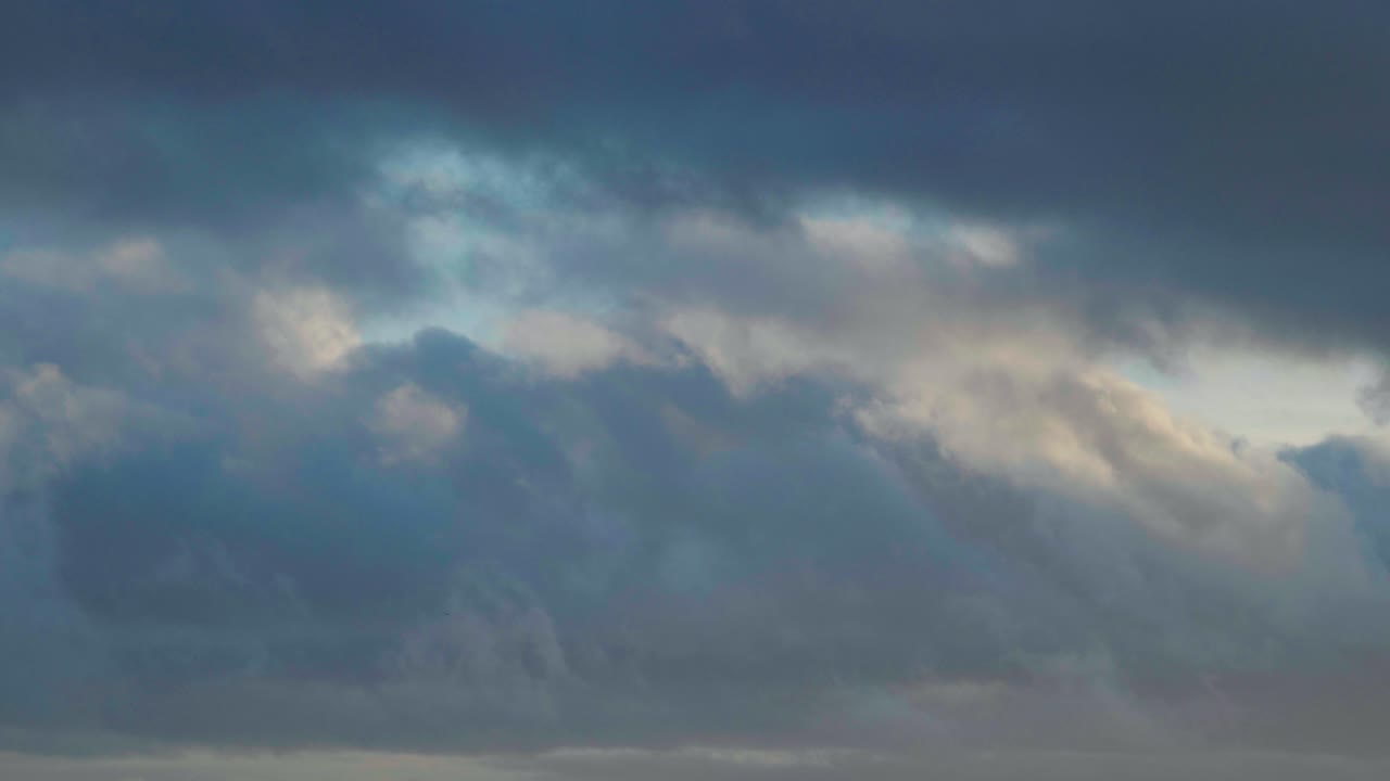 4K Cinematic landscape shot of clouds in the sky during sunset, on Portland, Dorset