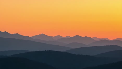 mountains,sunset,sky,landscape,horizon,layers,nature,silhouette,orange,blue,peaceful,scenery,gradient,view,tranquility,evening,clouds,light,wilderness,beauty,depth,mystery,tranquil,photography,outdoors,colors,atmosphere,panorama,rays,visual,serenity,explore,wild,colorful,fresh,vast,stillness,peace