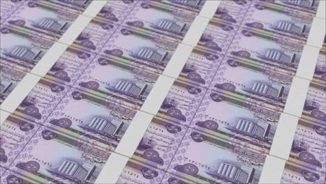 billetes de 50 dinares iraquíes impresos por una prensa de dinero