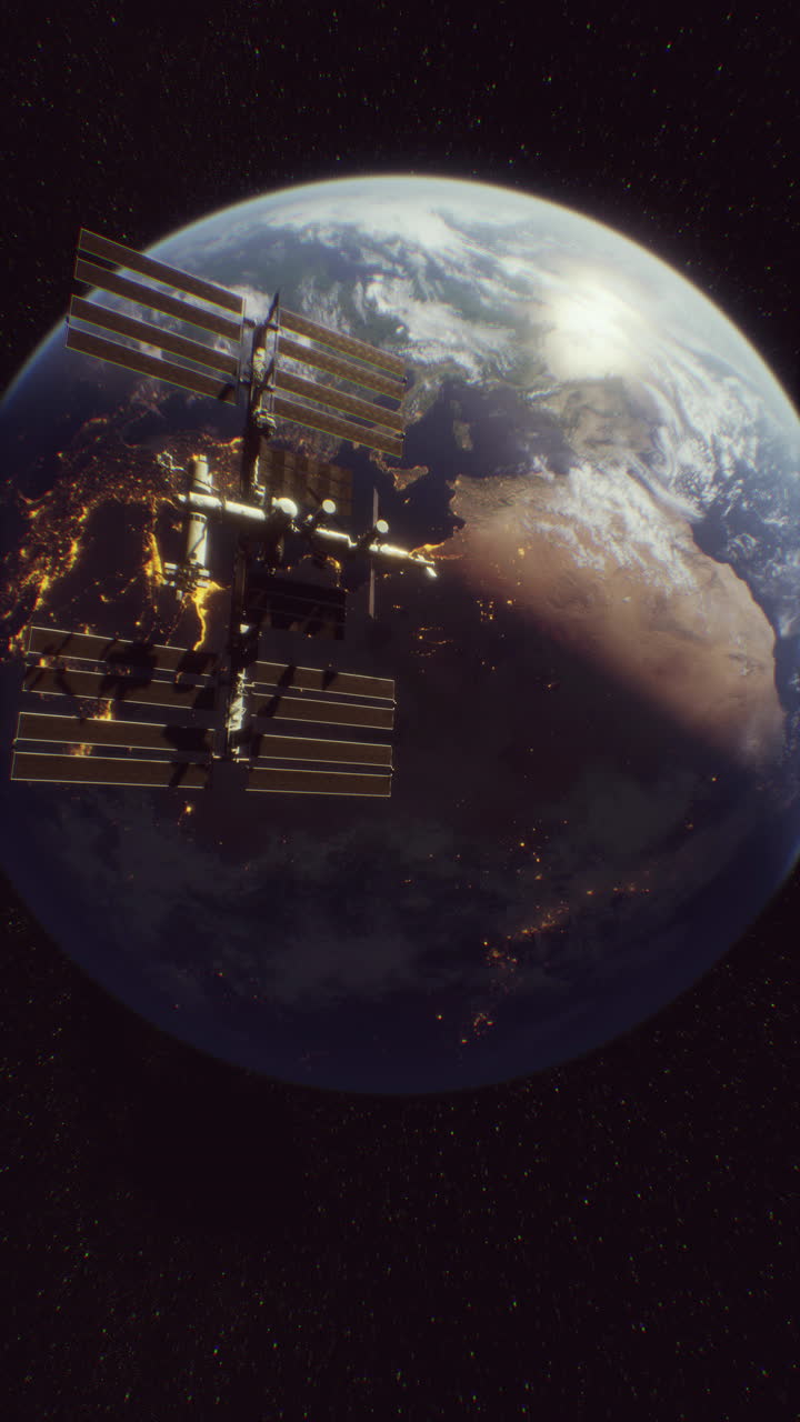 estación espacial internacional en órbita alrededor de la tierra por la noche