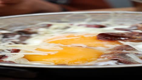 turkish breakfast with eggs and meat