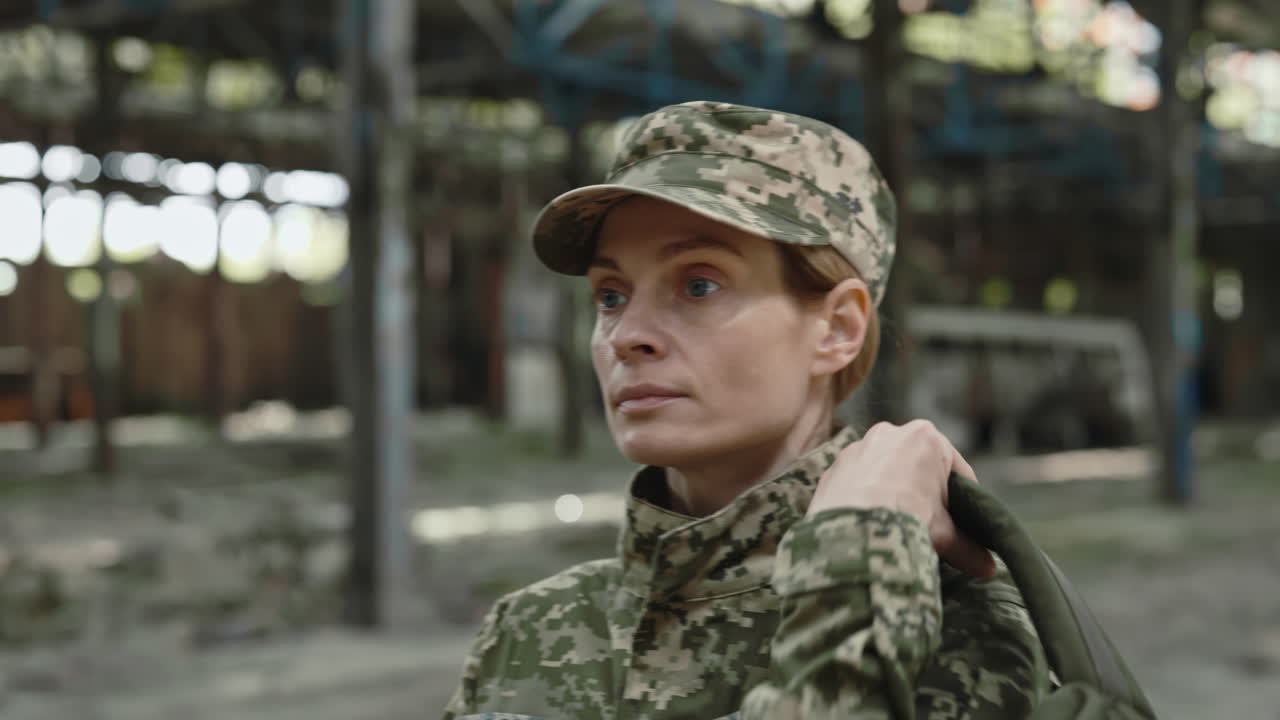 Woman Soldier in a Damaged Building