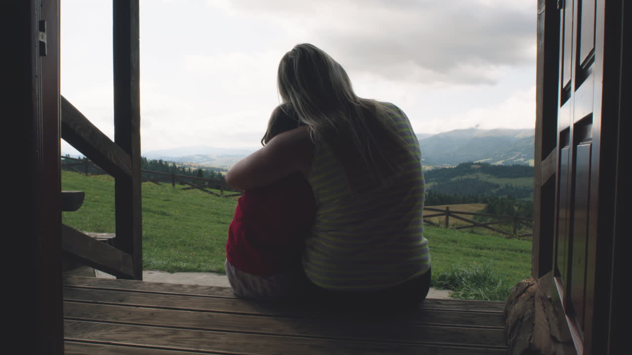 Mother and Child Enjoying a Mountain View