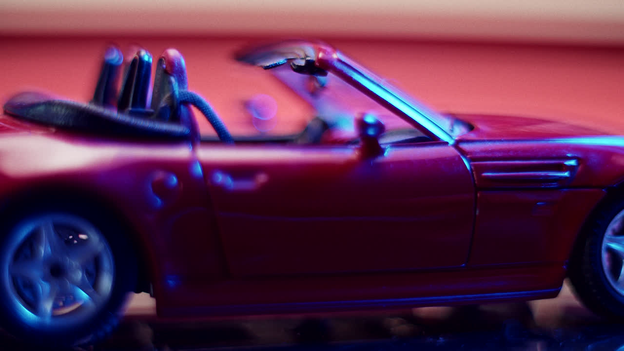 Stylized Close-up of a Red Toy Convertible Car