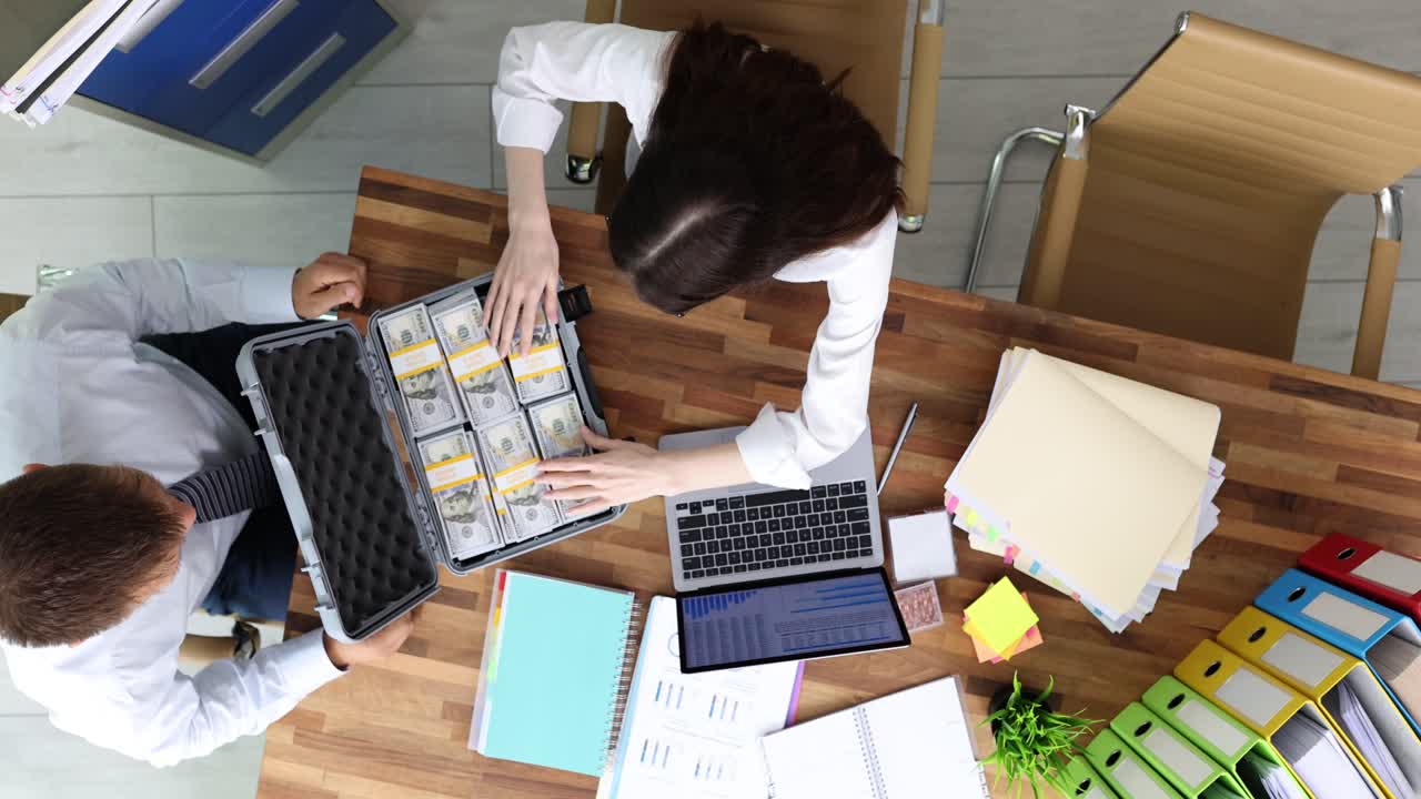 Business Meeting with Money and Technology