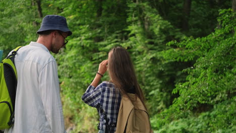 couple hiking in the woods