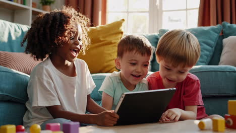 kids enjoying screen time and bonding over a tablet at home