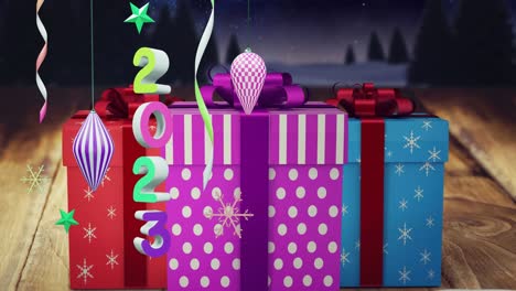 Animation-of-2023-text-and-christmas-decorations-in-background