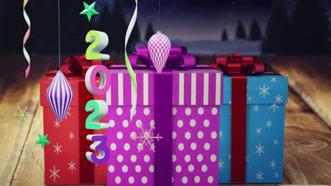 animación del texto de 2023 y decoraciones navideñas en el fondo