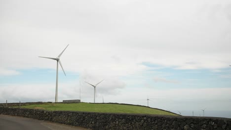 Wind-turbines-on-a-green-field-in-Azores