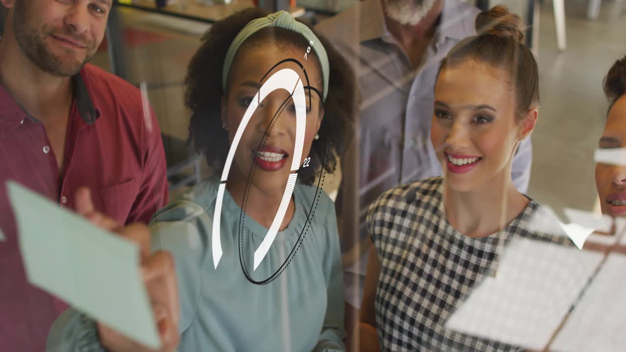 Lead woman placing blue sticky note on glass HUD overlay tracking motion and aligning business plan