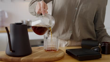 woman pouring coffee