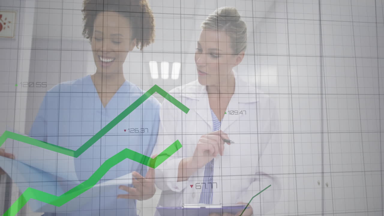 In hospital, healthcare professionals analyzing data charts, focusing on patient care