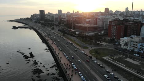 static aerial view of the city traffic in the coast, montevideo uruguay