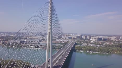 Beautiful-4k-long-aerial-shot-of-Ada-bridge-in-Belgrade-and-Sava-river