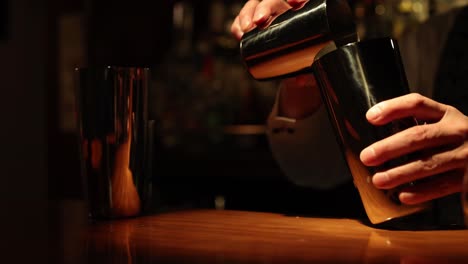 sequence of a bartender preparing a drink