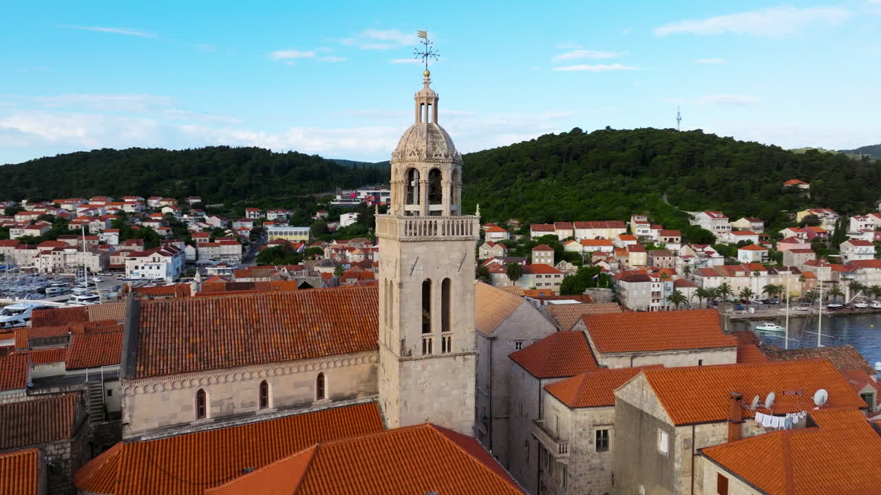 Korcula Old Town Houses, Bell Tower And Saint Marks Cathedral In Korcula, Croatia At Sunrise. - aerial shot