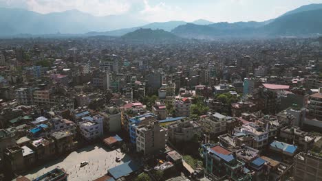 aerial view of kathmandu, the capital of nepal with mountains in the background