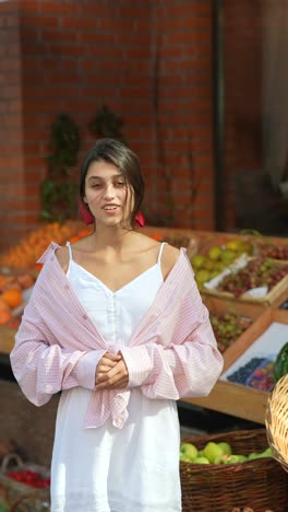 woman shopping for fresh fruit at a market