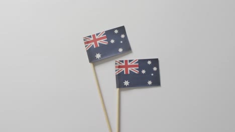 video of flags of australia lying on white background