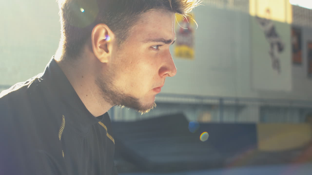 Young Man Eating a Sandwich Outdoor/Indoor
