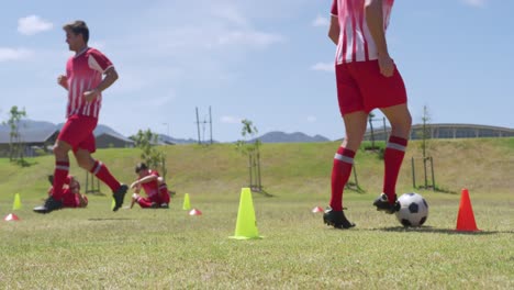 soccer players training on field