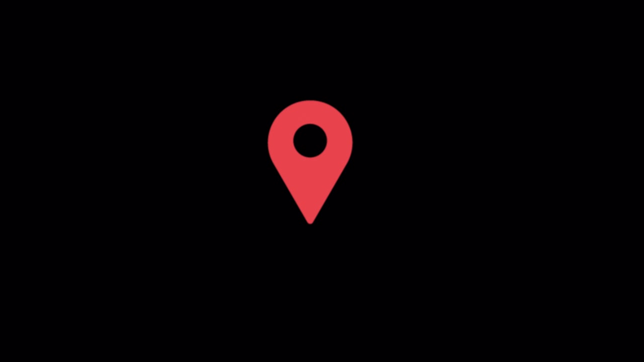 Red Map Pin Location Icon on Black Background