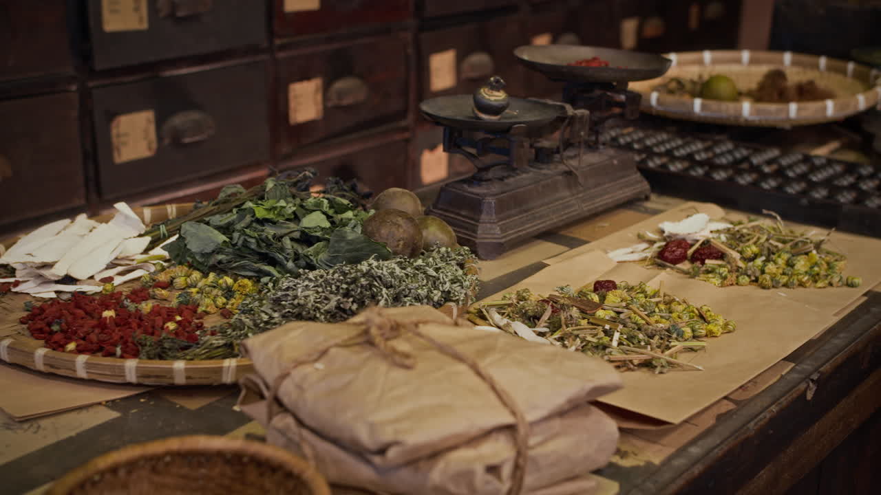 Herbal Medicine Ingredients and Scales on Table at Drug Store