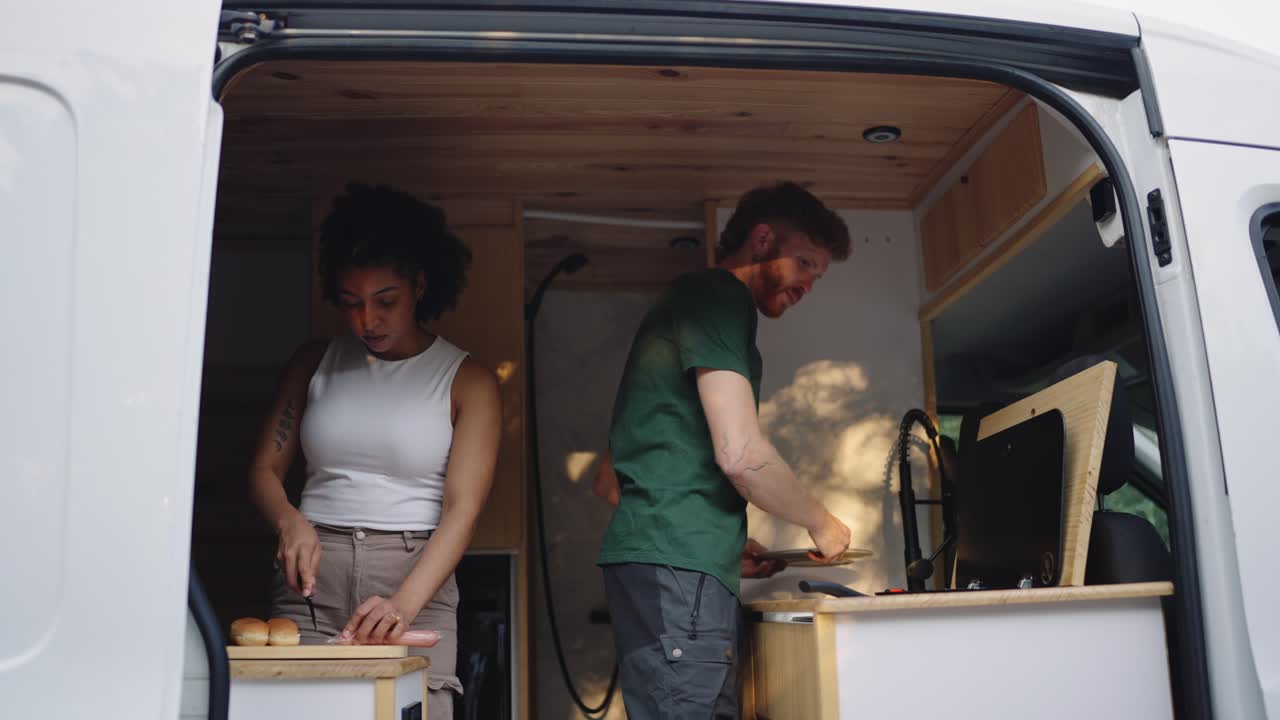 Couple Cooking in Campervan