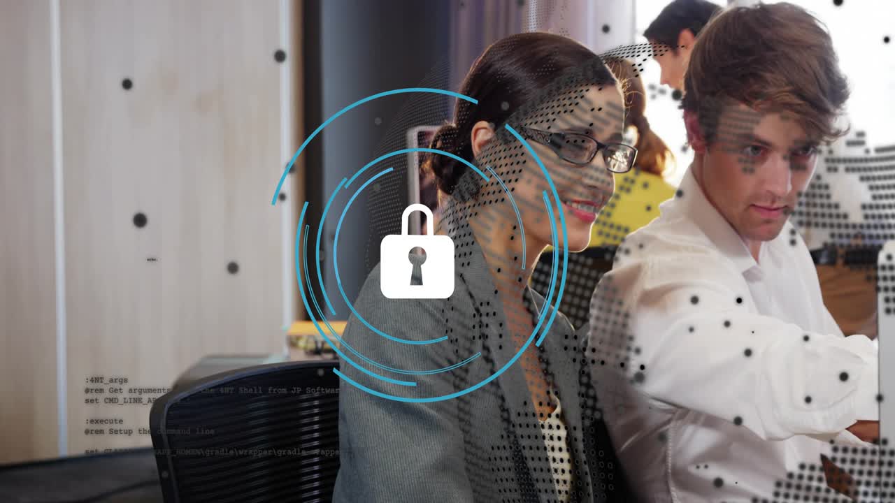Woman leaning, pointing, man typing while padlock map overlay appearing over monitor, securing data