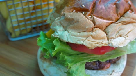 close up of a delicious hamburger with french fries