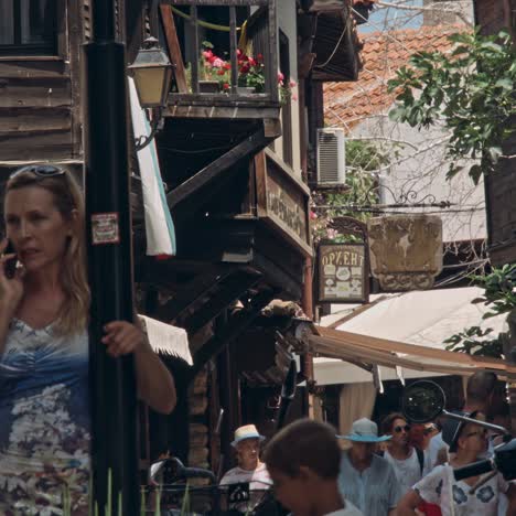 people walk through streets of ancient nesebar