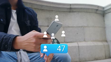 Animation-of-profile-icon-with-increasing-numbers-over-mid-section-of-biracial-man-using-smartphone