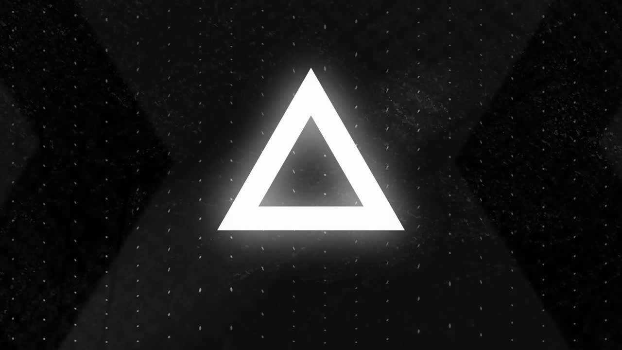 검은 바탕에  ⁇  점 위에 반 ⁇ 이는 회색과  ⁇ 색 삼각형의 애니메이션