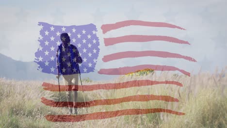 Animation-of-american-flag-moving-over-man-hiking